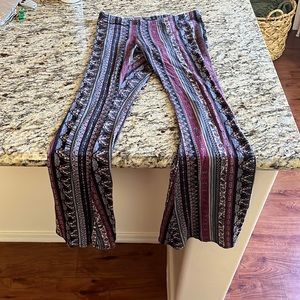 Patterned flare legged pants.